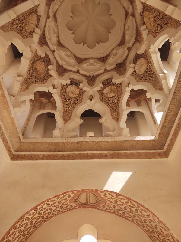 Elaborately decorated dome interior in the Qubba el-Ba'adiyyin in Marrakech, Morocco.