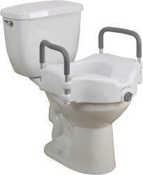 Toilet booster seat with padded hand rails
