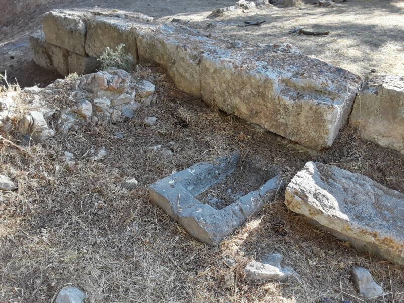 Public toilet area at the right rear corner of the First Terrace at the Asclepeion.