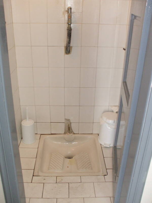 Public squat toilet on the Greek island of Mykonos.