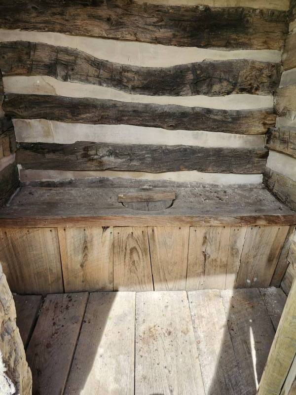 Single-seat Outhouse at the original Johnson cabin in the Johnson Settlement.