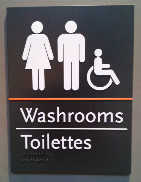 Sign for the public washrooms (or toilettes) in Ottawa, Canada.