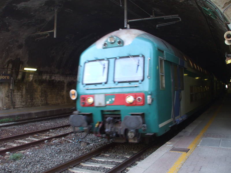 Italian train passing through a tunnel in the Cinque Terre area.