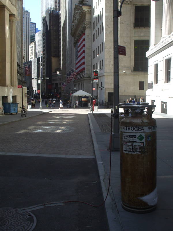 Dewar vacuum flask of liquid nitrogen along the street in front of the New York Stock Exchange, in Manhattan's Financial District.