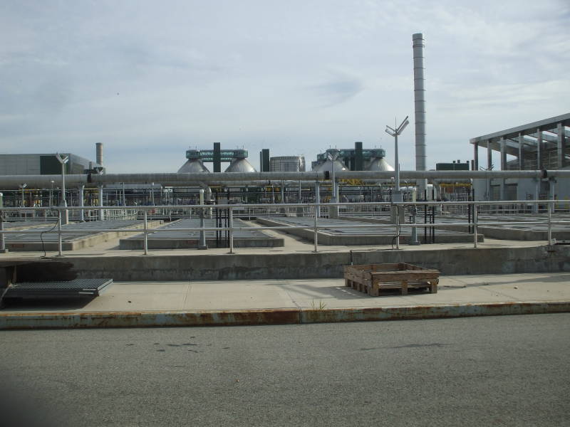 Sedimentation tanks in the foreground, aeration tanks in the background, at the Newtown Creek Wastewater Treatment Plant.