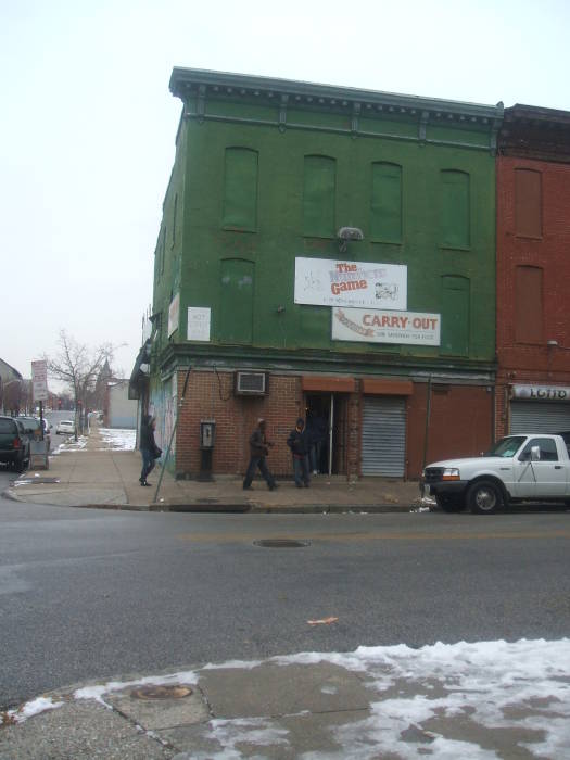 Shop selling malt liquor and lottery tickets in West Baltimore, Maryland.