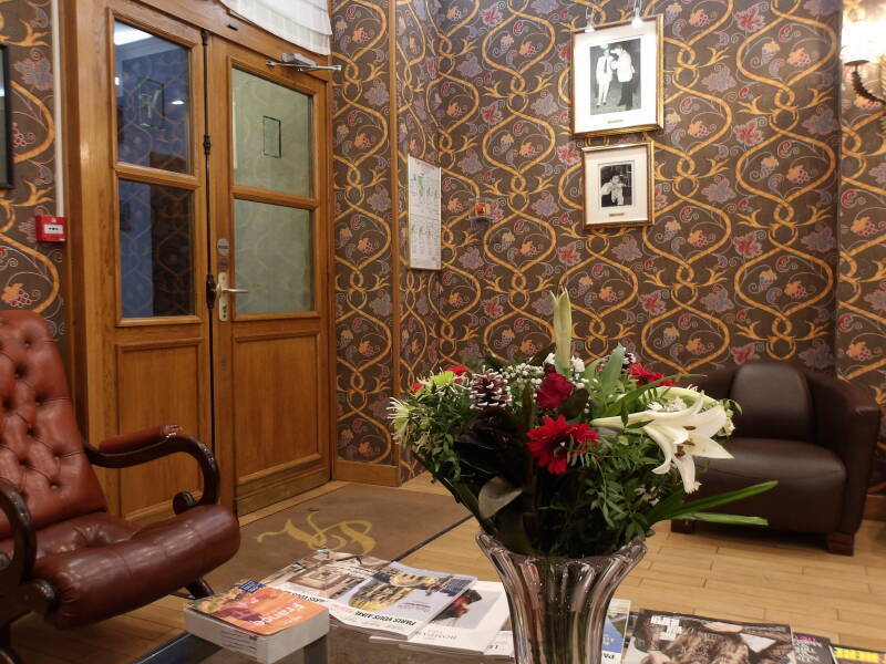 Lobby of the former 'Beat Hotel', picture of William S. Burroughs and Brion Gysin at top to right of entry door.