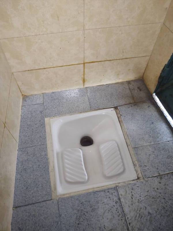 Squat toilet at Café Hafa in Tangier, Morocco.