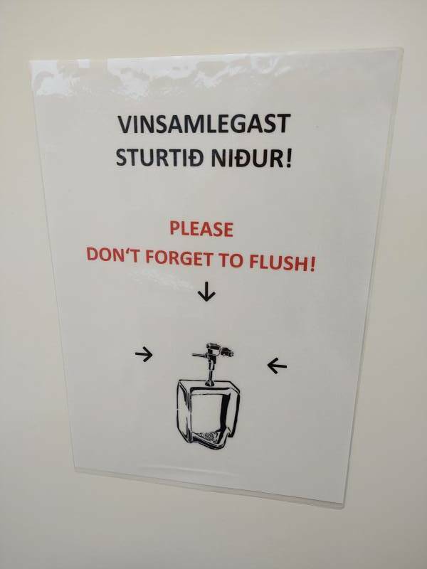 'Flush the urinal' sign at Dyrhólaey.