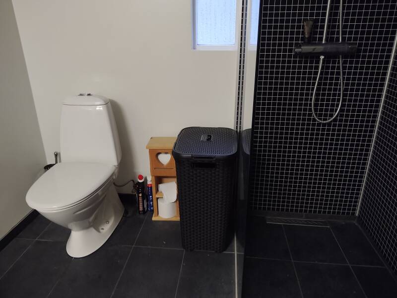 Toilet and shower at Grand-Inn Bar and Bed in Sauðárkrókur
