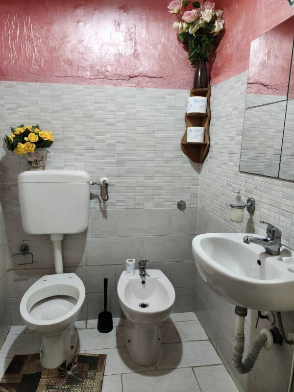 Toilet, bidet, and sink at B&B Miraglia in the centro storico of Napoli.
