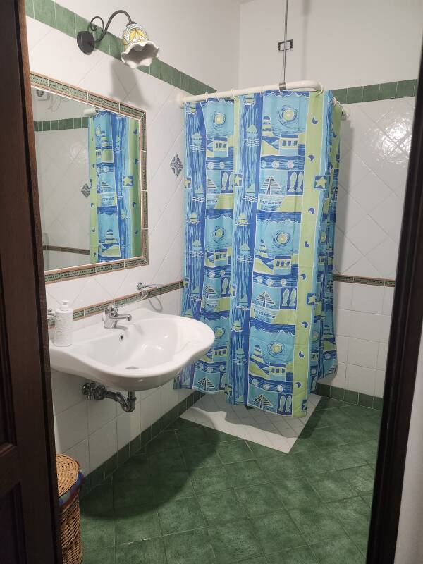 Sink and shower at Pedra Residence on Stromboli.