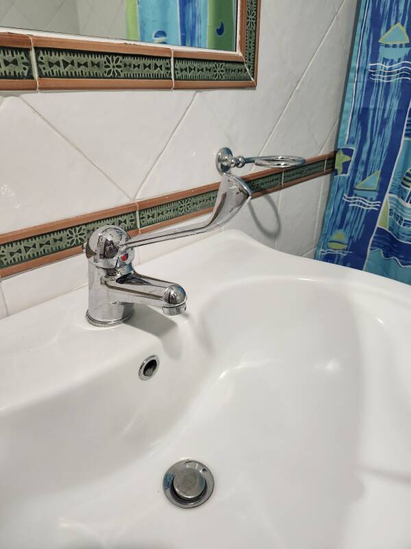 Long handled sink control at Pedra Residence on Stromboli.