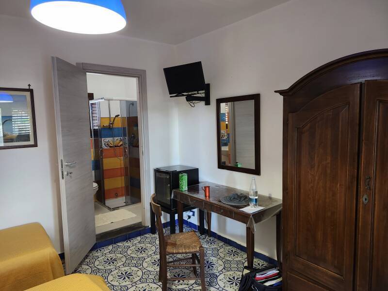 Small step up into the bathroom at Hotel Al Togo on Vulcano.