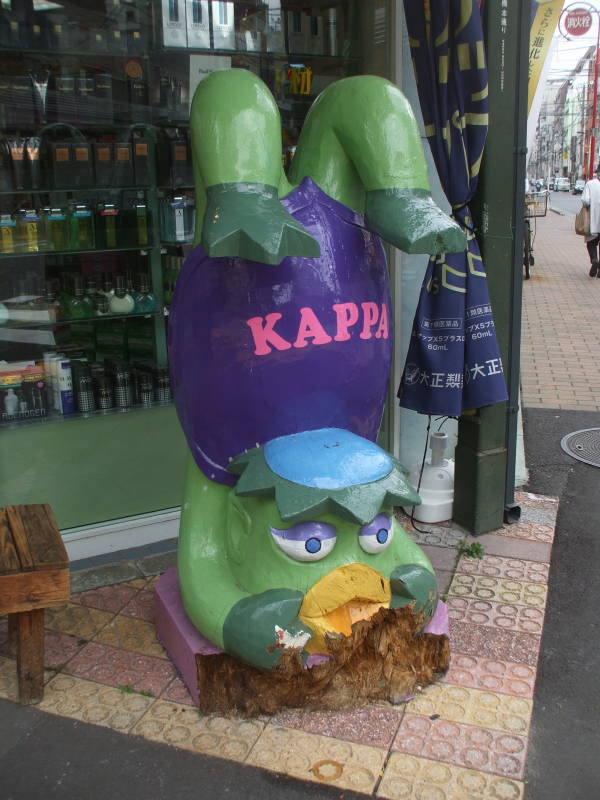 Kappa statue outside a kitchen supply store in Kappabashi-dori or Kitchen Town district of Tokyo.