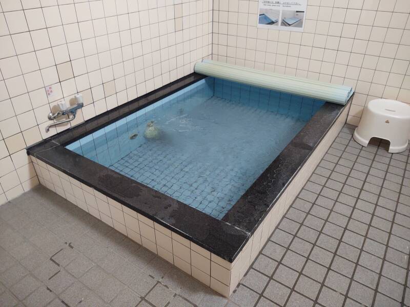 Bath room in a ryokan, hot water tub.