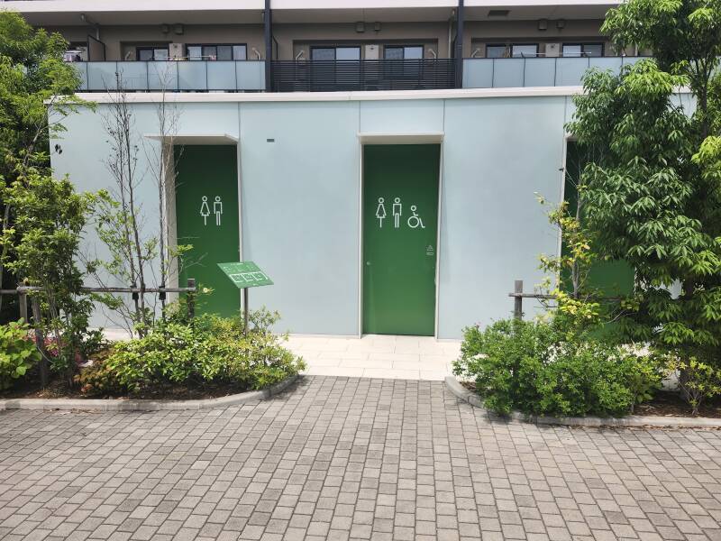 Entry doors to the Nishihara 1-chōme Public Toilet: two shared men's and women's toilets and a universal toilet.