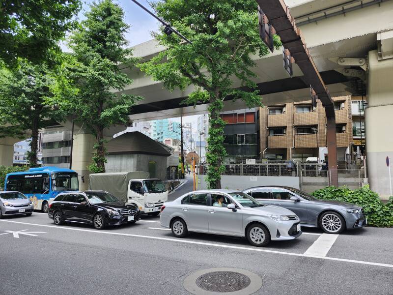 Urasando Public Toilet, under an elevated highway.