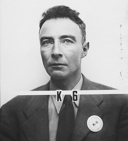 J. Robert Oppenheimer's Los Alamos ID badge, from https://commons.wikimedia.org/wiki/File:Oppenheimer-j_r.jpg