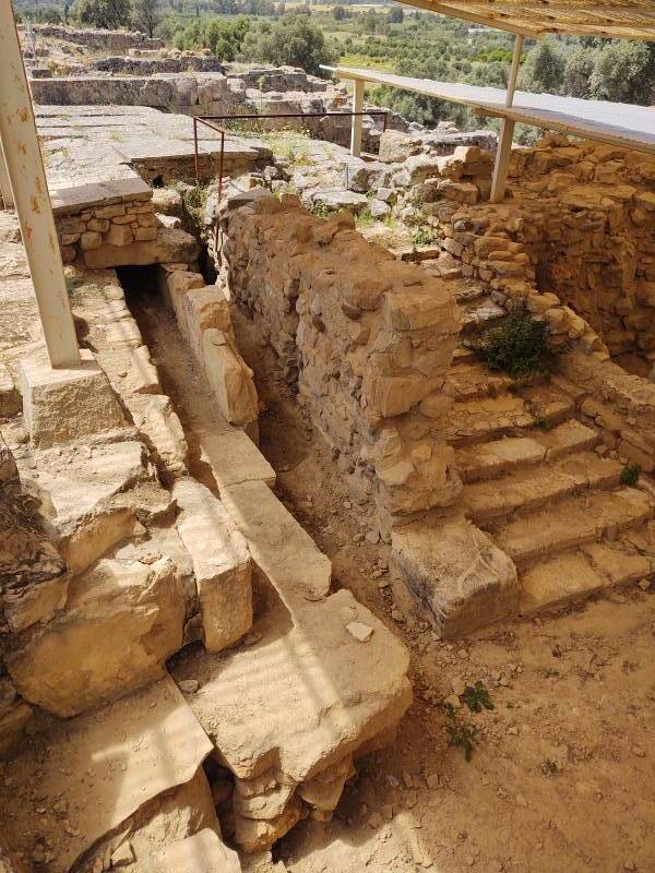 Drain alongside a staircase in the larger villa at the Minoan settlement of Agia Triada in south-central Crete.