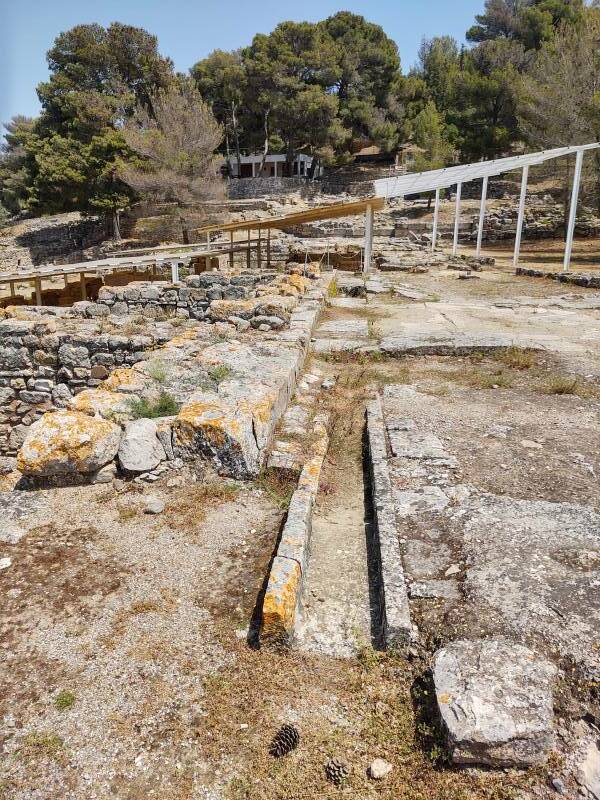 Drain along the side of the large open plaza at the Minoan settlement of Agia Triada in south-central Crete.