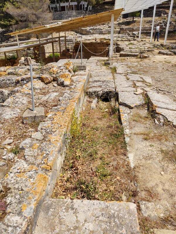 Drain along the side of the large open plaza at the Minoan settlement of Agia Triada in south-central Crete.