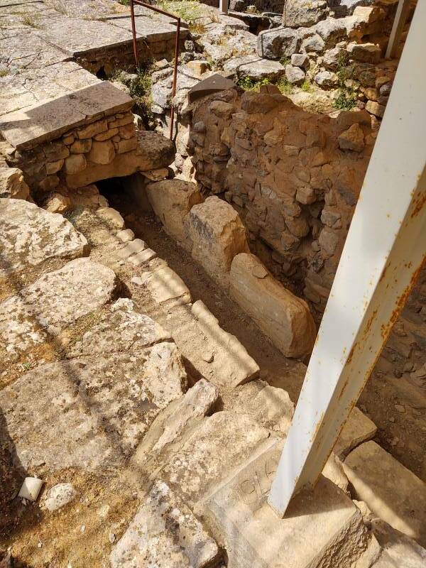 Drain alongside a staircase in the larger villa at the Minoan settlement of Agia Triada in south-central Crete.