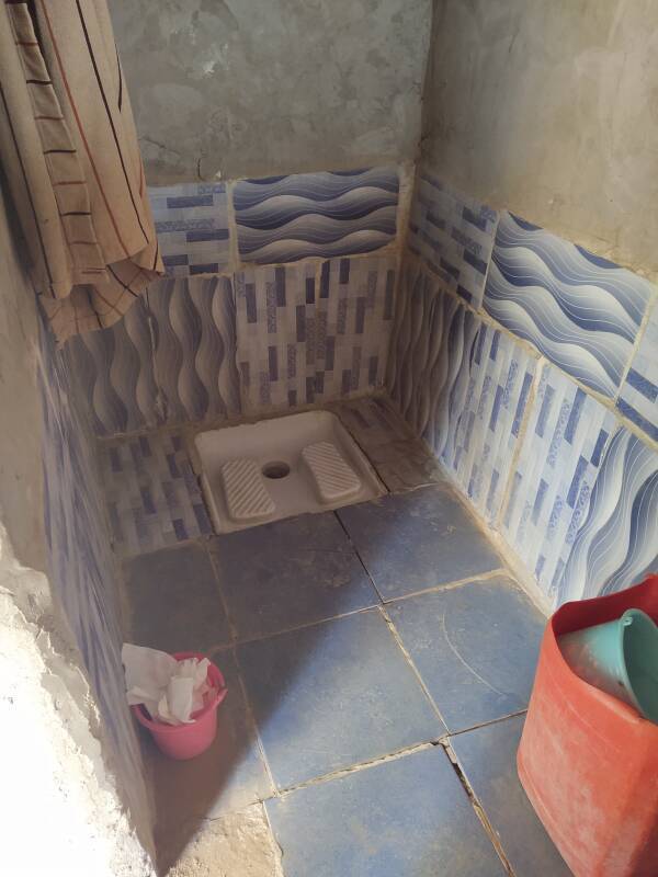Squat toilet at an oasis in the Sahara desert between M'Hamid and Erg Chigaga.