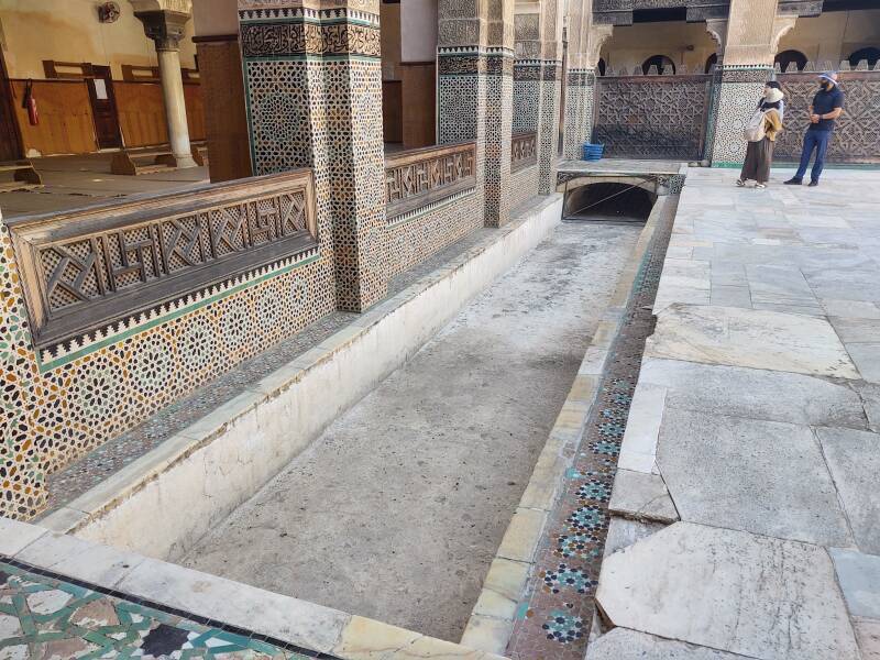 Small canal in the courtyard of Bou Inania Madrasa in the Fez el Bali medina.