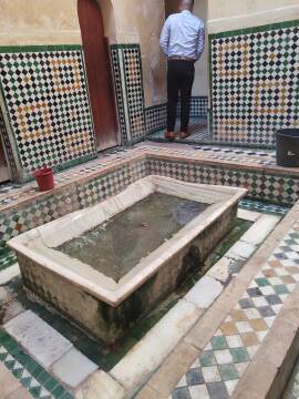 Ablutions fountain in the Bou Inania Madrasa in Fez el Bali medina.