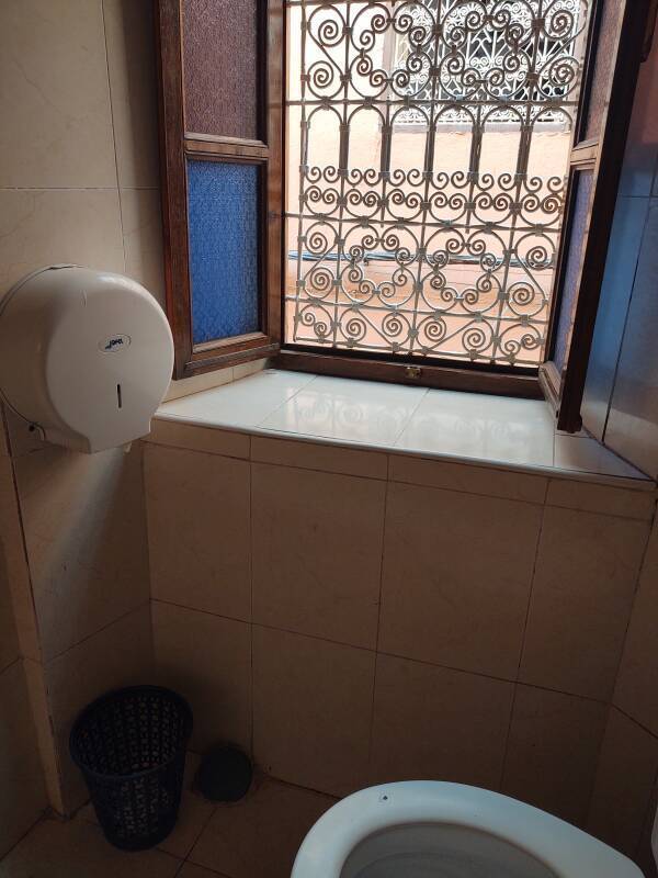 View out the window of the shared bathroom upstairs in Hôtel Atlas in Marrakech.