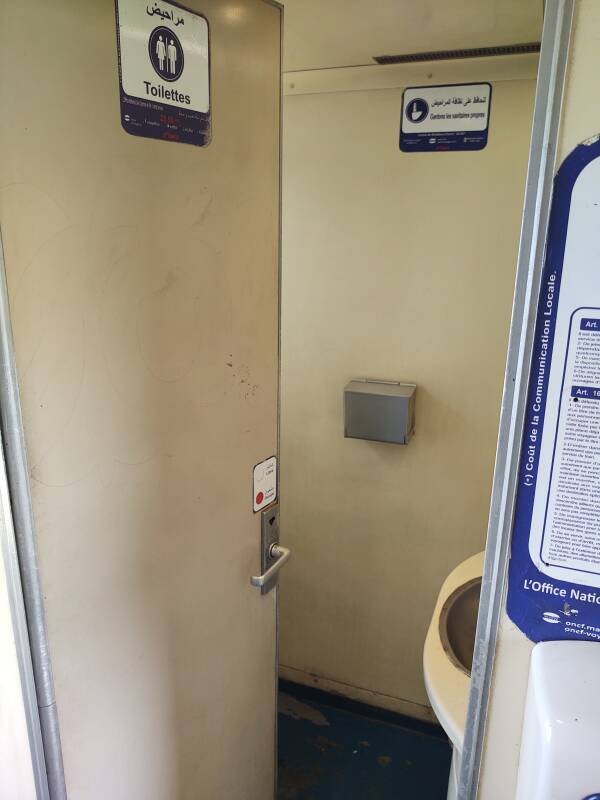 Entering the toilet compartment on the passenger train from Kenitra to Meknès.