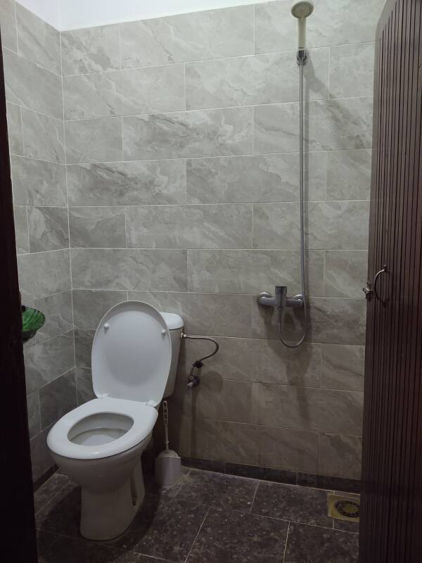 Shared toilet and shower at Karim Sahara guesthouse in Zagora.