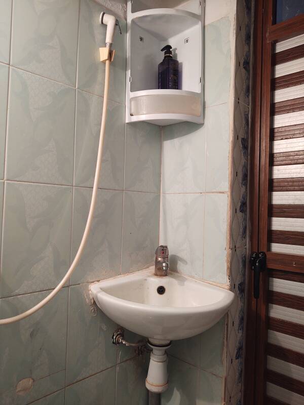 Sink in a shared bathroom at Karim Sahara guesthouse in Zagora.