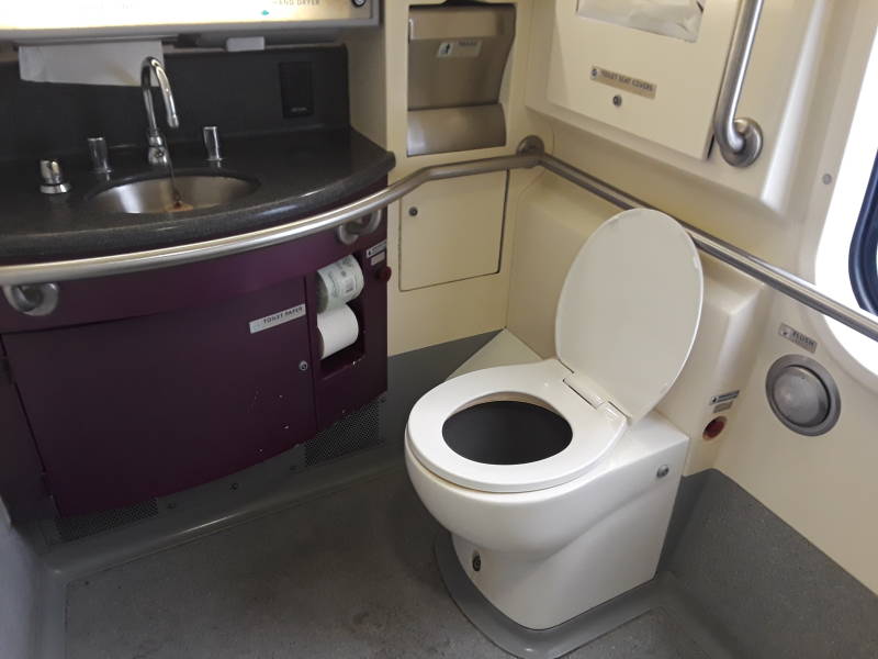 Wheelchair-accessible toilet on board an Amtrak Acela train.