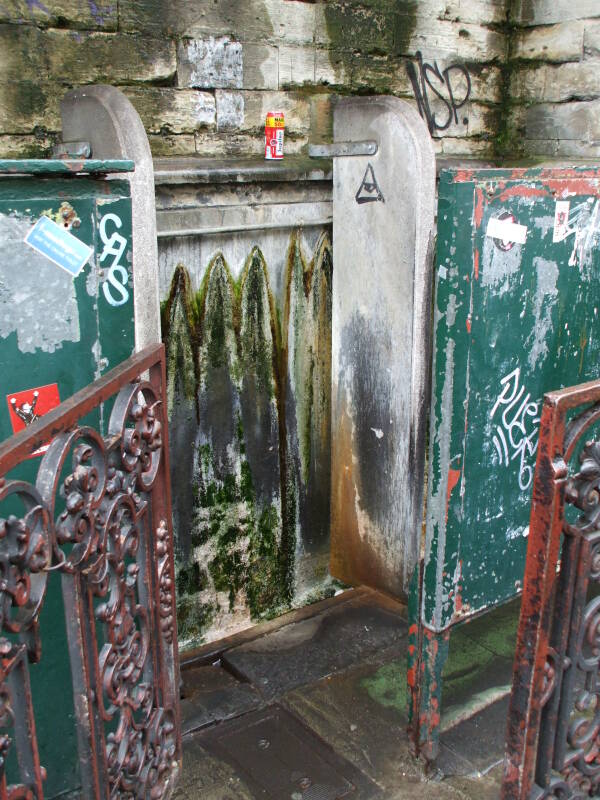 An open-air pissoir or public urinal as Saint Catherine's Cathedral in Brussels.