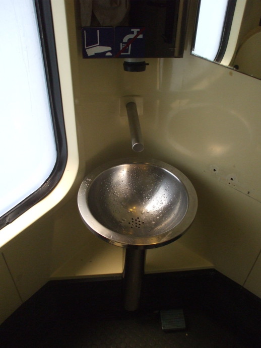Washroom on board EuroCity passenger train from Budapest to Prague.