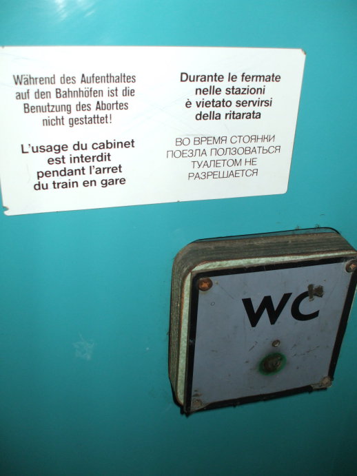Sign in the toilet compartment on board a Bulgarian overnight train.