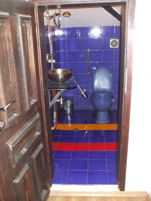 Sparkling clean bright blue bathroom at Be My Guest hostel in Sofia.