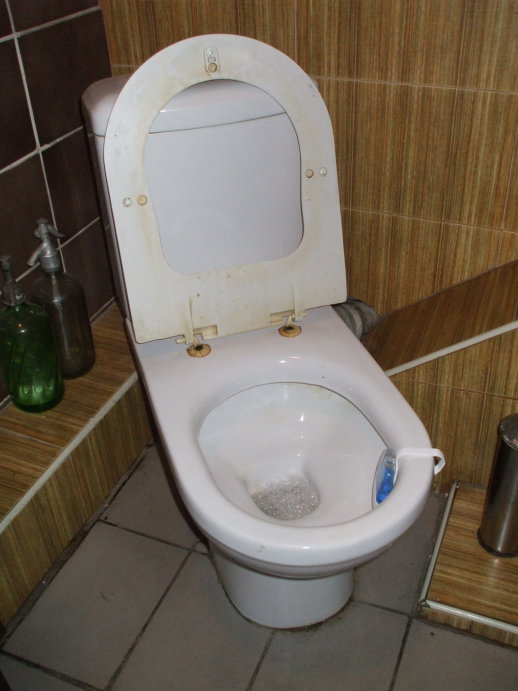 Sparkling clean brown bathroom at Be My Guest hostel in Sofia.