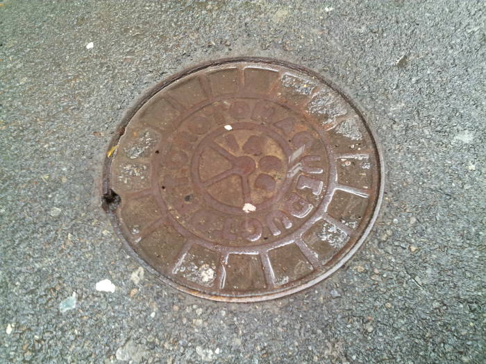 1866 manhole cover from the Croton Aqueduct on Jersey Street in Nolita, Manhattan.