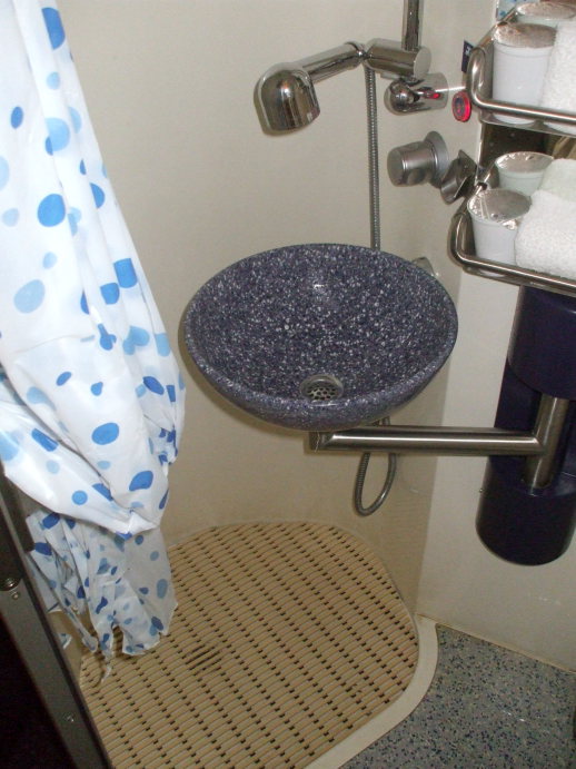 Private toilet and shower in a first class sleeper compartment on board the City Night Line passenger train from Prague to Berlin, Köln, and Amsterdam.