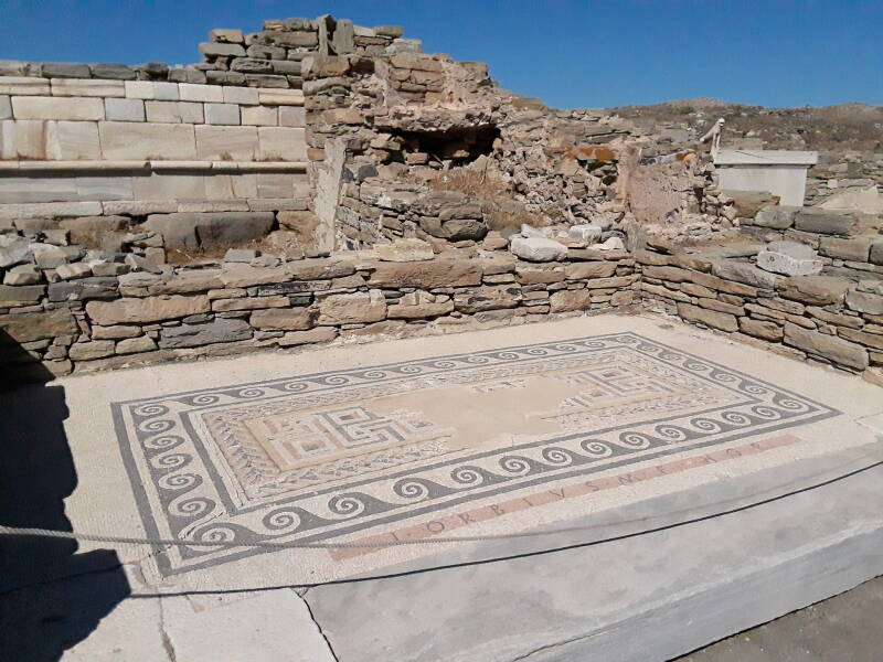 Mosaic along the west side of the Agora of the Italians, next to the Letoön, at Delos.