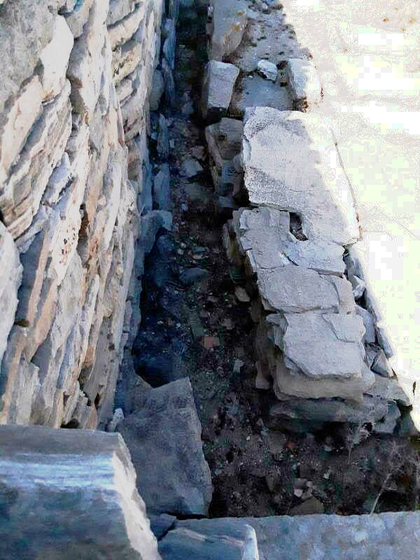 Latrine and drain in a house in the Skardana Quarter.