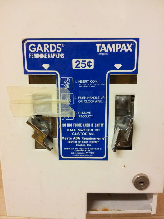 Tampon dispenser in unisex restroom in the Electrical Engineering building at Purdue University.