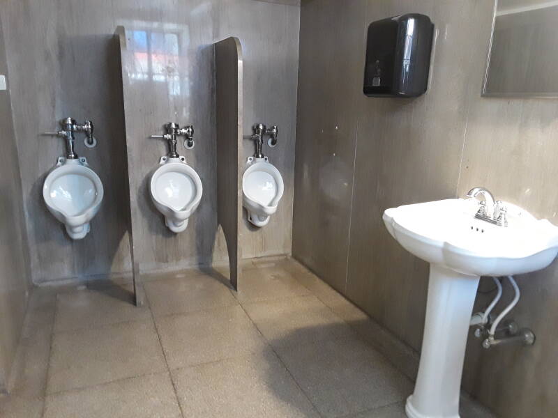 Urinals and sink at The Folger Library in Washington DC, USA.