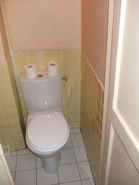 Hallway toilet in Paris.