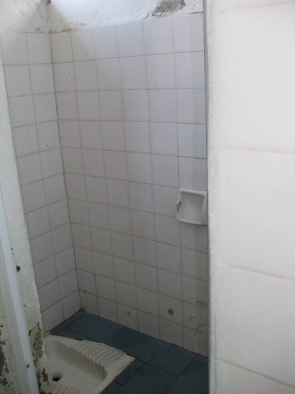 Squat toilet at the train station in Kalambaka, Greece.