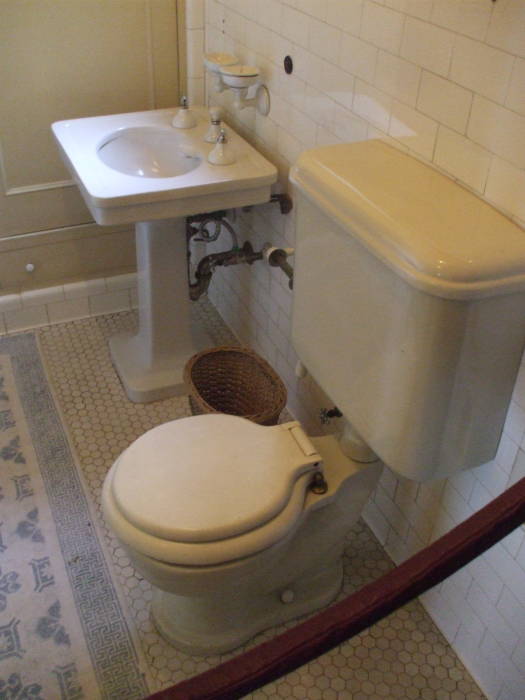 Toilet and pedestal sink at William Randolph Hearst's estate at San Simeon, California.