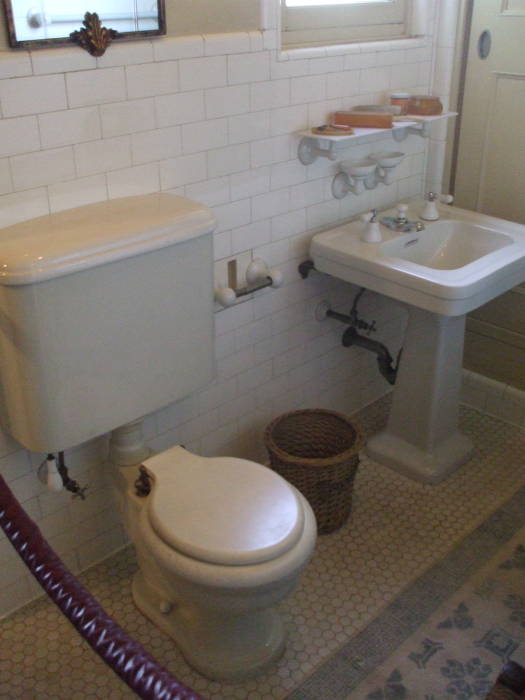 Toilet and pedestal sink at William Randolph Hearst's estate at San Simeon, California.